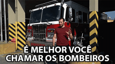 Man In Front Of Fire Truck Melhor Você Chamar Os Bombeiros GIF