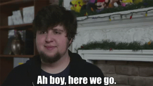 Man In Front Of Fireplace Saying Ah Boy Here We Go GIF