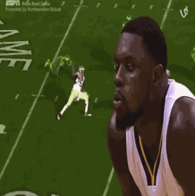 Man In Front Of Football Field Number 40 GIF