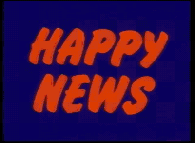 Man In Front Of Happy News Screen GIF