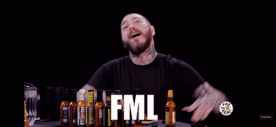 Man In Front Of Hot Sauce Bottles FML GIF