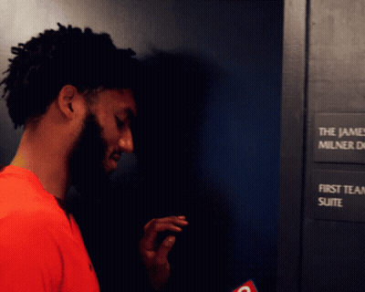 Man In Front Of James Milner D First Team Suite Sign GIF
