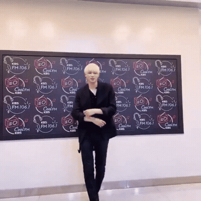 Man In Front Of KBS FM 106.7 Wall GIF