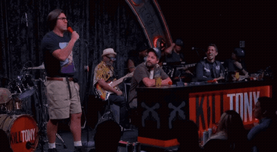 Man In Front Of Kill Tony Drum GIF