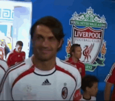 Man In Front Of Liverpool FC Logo GIF