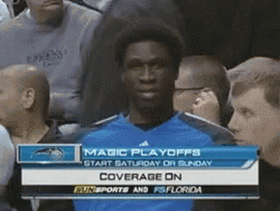 Man In Front Of Magic Playoffs Screen GIF