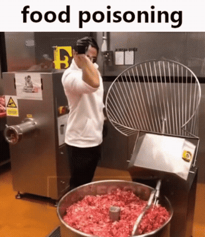 Man In Front Of Meat Grinder Food Poisoning GIF