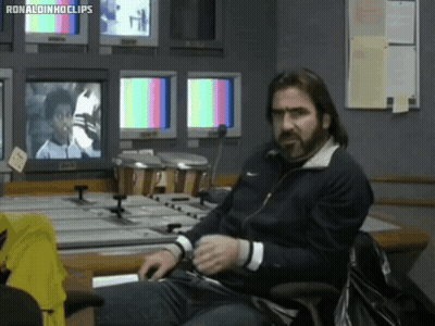 Man In Front Of Monitors With Ronaldinho Clips GIF
