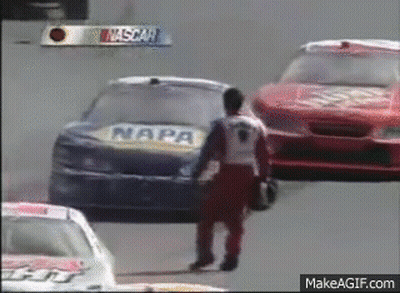 Man In Front Of NASCAR Race Car GIF