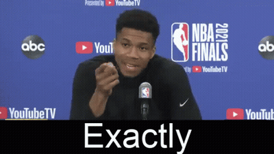 Man In Front Of NBA Finals Sign GIF