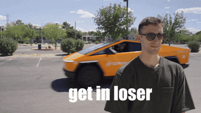 Man In Front Of Orange Car Saying Get In Loser GIF