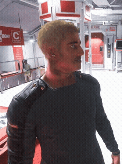 Man In Front Of Outlet Sign GIF