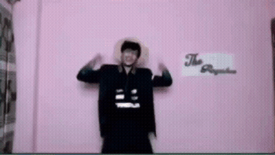 Man In Front Of Pink Wall Saying The Republic GIF