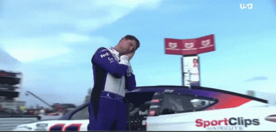 Man In Front Of Race Car Saying Sport Clips GIF