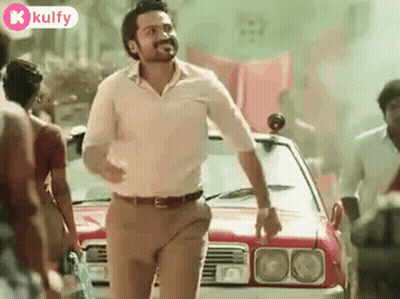 Man In Front Of Red Car GIF