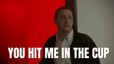 Man In Front Of Red Door Saying You Hit Me In The Cup GIF