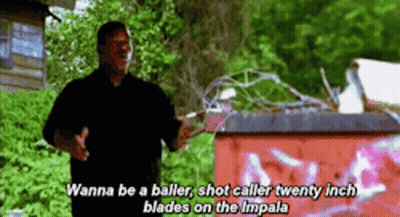 Man In Front Of Red Dumpster Says Wanna Be A Baller GIF