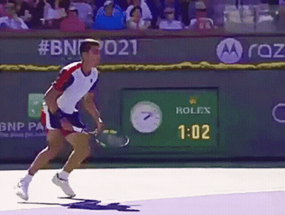 Man In Front Of Rolex Advertisement GIF