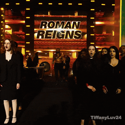 Man In Front Of Ryan Reins Sign GIF