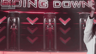Man In Front Of Screen Saying Going Down GIF