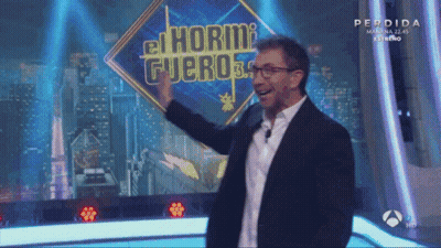 Man In Front Of Sign Saying El Hormi Fuero GIF