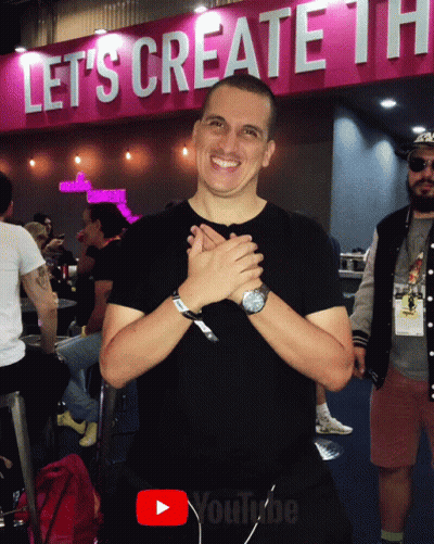 Man In Front Of Sign Saying Let 'S Create The GIF