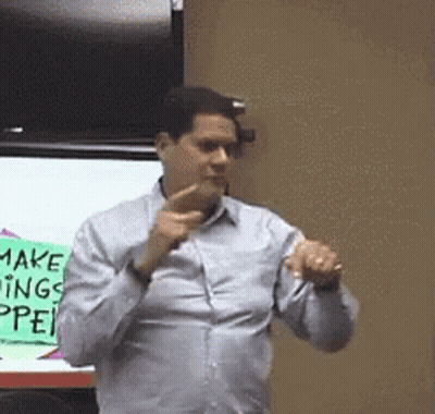Man In Front Of Sign Saying Make Things Happen GIF