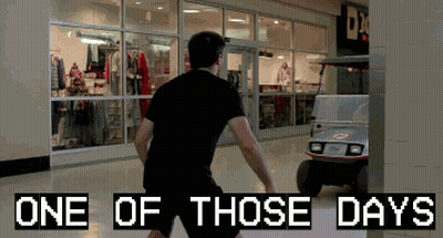 Man In Front Of Store Saying One Of Those Days GIF