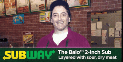 Man In Front Of Subway Ad GIF