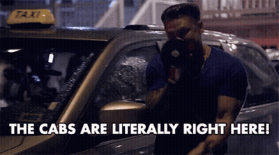 Man In Front Of Taxi Saying The Cabs Are Literally Right Here GIF