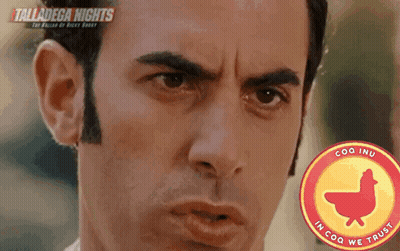 Man In Front Of Tires And Talladega Nights Sign GIF