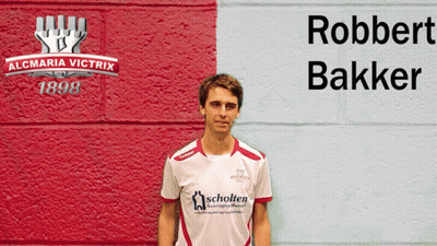 Man In Front Of Wall Saying Robbert Bakker GIF