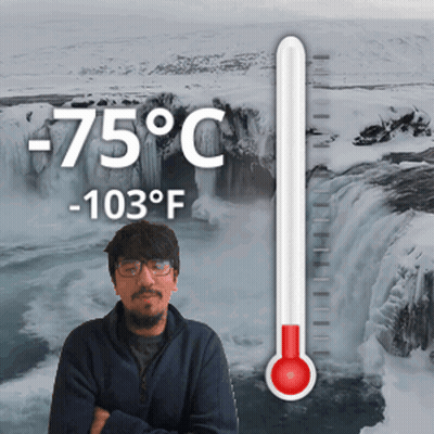 Man In Front Of Waterfall With -85°F Thermometer GIF
