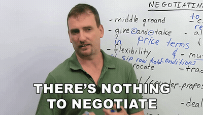 Man In Front Of White Board Saying Nothing To Negotiate GIF