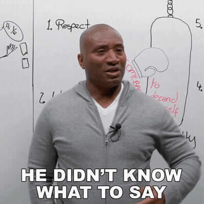 Man In Front Of Whiteboard Saying He Didn't Know What To Say GIF