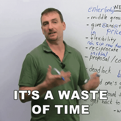 Man In Front Of Whiteboard Saying It's A Waste Of Time GIF
