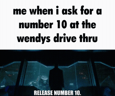 Man In Front Of Window Saying Release Number 10 GIF