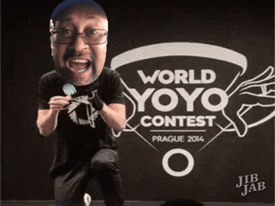 Man In Front Of World Yoyo Contest Sign GIF