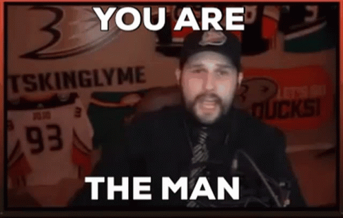 Man In Front Of You Are The Man Sign GIF