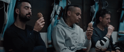 Man In Frosty Hoodie Eating Ice Cream GIF
