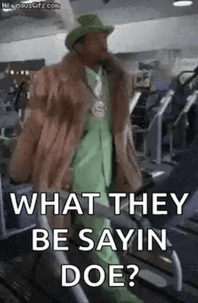 Man In Fur Coat And Green Suit On Treadmill GIF