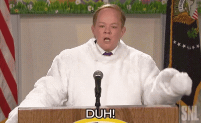 Man In Fur Coat At Podium Saying Duh GIF
