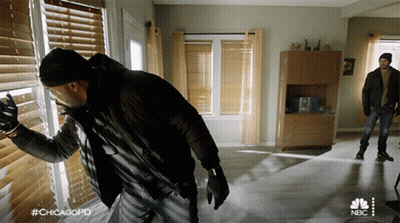 Man In Fur Coat Dancing On Stage With Ilja Sign GIF