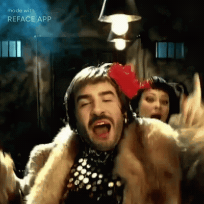Man In Fur Coat Dancing With Woman GIF