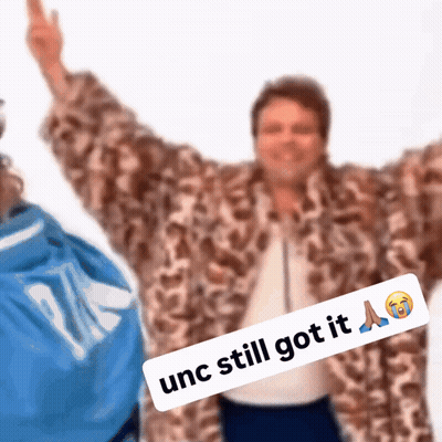 Man In Fur Coat Giving Middle Finger Saying UNC Still Got It GIF