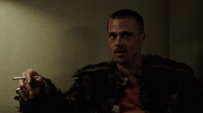 Man In Fur Coat Holding Cigarette GIF
