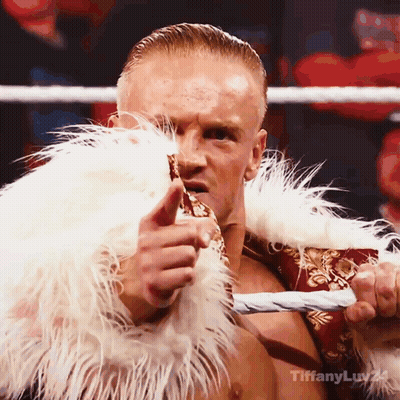 Man In Fur Coat Holding Rope Says Tiffanyluy24 GIF