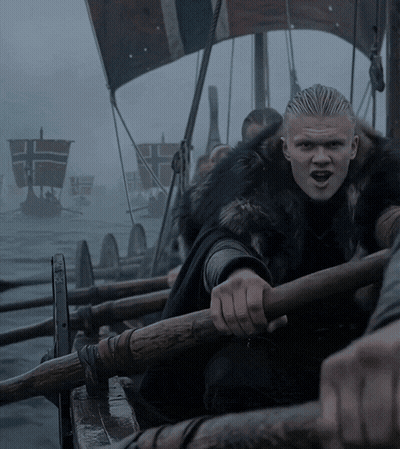 Man In Fur Coat Rowing Boat GIF