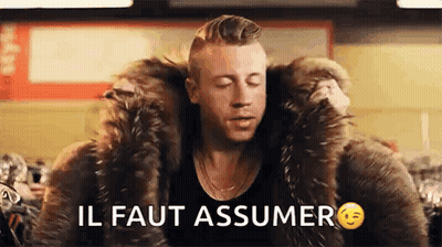 Man In Fur Coat Saying Il Faut Assumer GIF