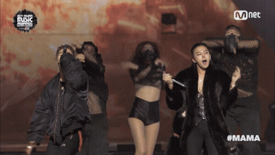 Man In Fur Coat Singing Into Microphone GIF